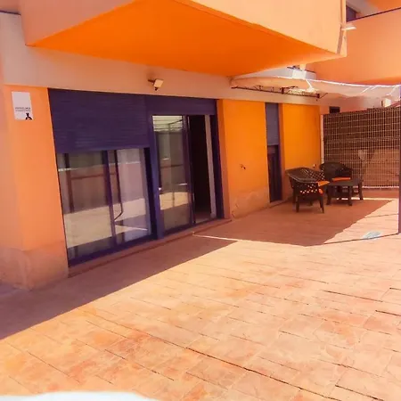 Piso Planta Baja Y Gran Patio Con Piscina Comunitaria
